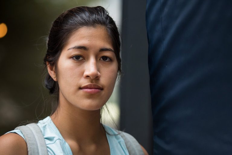 Emma Sulkowicz poses with a mattress. (Getty Images)
