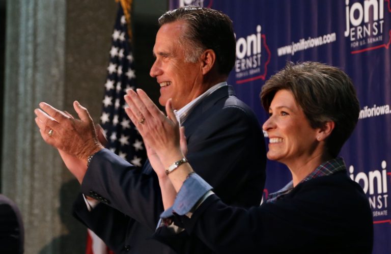 Former Republican presidential nominee Mitt Romney campaigns for Joni Ernst at Iowa Farm Bureau Headquarters in West Des Moines, Iowa, Sunday, Oct. 12, 2014. Ernst is in a close race with Bruce Braley for the U.S. Senate seat being vacated by Tom Harkin. (AP Photo/The Register, Mary Willie)