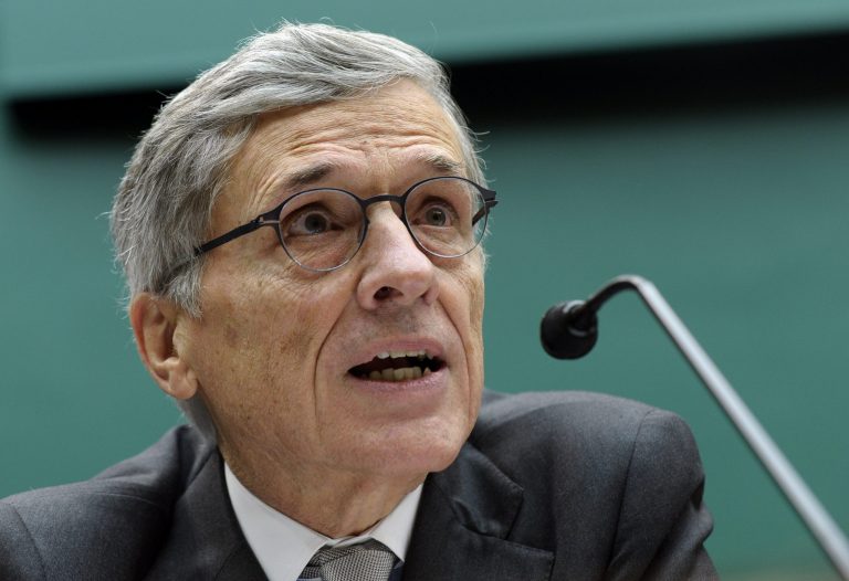 Federal Communications Commission (FCC) Chairman Tom Wheeler testifies on Capitol Hill in Washington, Thursday, Dec. 12, 2013, before the House Energy and Commerce Committee hearing on cell phones on planes. As one part of the federal government looks to remove restrictions on making phone calls from airplanes, another agency is apparently considering its own prohibition. Wheeler told members of Congress that while his agency sees no technical reason to ban calls on planes, Transportation Secretary Anthony Foxx told him Thursday morning that the DOT will be moving forward with its own restrictions.  (AP Photo/Susan Walsh)