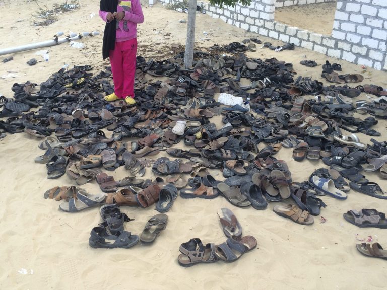 Discarded shoes of victims remain outside Al-Rawda Mosque in Bir al-Abd northern Sinai, Egypt. a day after attackers killed hundreds of worshippers, on Saturday. (AP Photo)