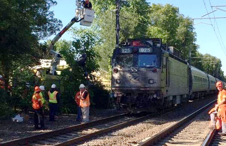 In this photo provided by the Massachusetts Bay Transportation Authority Transit Police via Twitter, officials work at the scene Monday, June 23, 2014, where an Amtrak train struck a vehicle overnight in Mansfield, Mass. Three people in the vehicle were killed. Service on Amtrak and MBTA lines was delayed while the crash was investigated. (AP Photo/Massachusetts Bay Transportation Authority Transit Police)