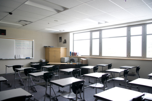 A new policy being considered would require students who attend middle schools outside their neighborhoods to apply to attend high school with their classmates. (Photo: Thinkstock)