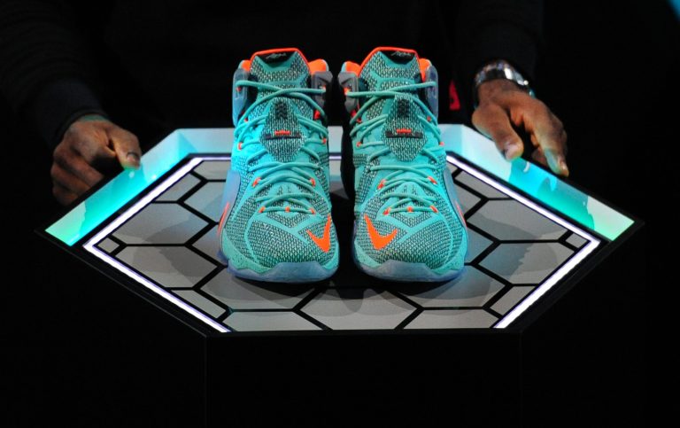 LeBron James introduces the LeBron 12 shoe at the Nike World Headquarters in Beaverton, Ore.,Tuesday, Sept. 16, 2014. (AP Photo/Steve Dykes)