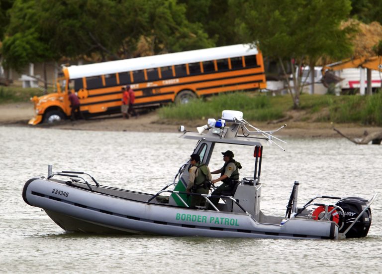 A U.S. Border Patrol boat secures the area on the Rio Grande river in Mission, Texas. U.S. Customs and Border Protection says rocks were thrown at CBP officers from the Mexican side of the river recently. (AP Photo/The Monitor, Gabe Hernandez)