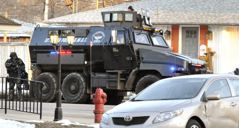 A debate about the militarization of Minnesota police forces has been renewed in light of the shooting of Michael Brown by a police officer in Ferguson, Mo. (AP Photo/The St. Cloud Times, Jason Wachter)