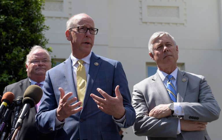 Rep. Greg Walden, R-Ore., center, speaks to reporters at the White House in Washington, Wednesday, May 3, 2017, following a meeting with President Donald Trump on healthcare reform. He is joined by Reps. Billy Long, R-Mo., left, and Rep. Fred Upton, R-Mich., right. The proposed amendment is a concession to centrists and would add $8 billion over five years to help pay for high medical costs. (AP Photo/Susan Walsh)