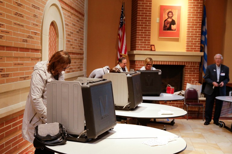 The Republican Party returned to a more narrow gender gap, with 53 percent of the primary electorate made up of men and 47 percent made up of women. (AP Photo/Michael Conroy)