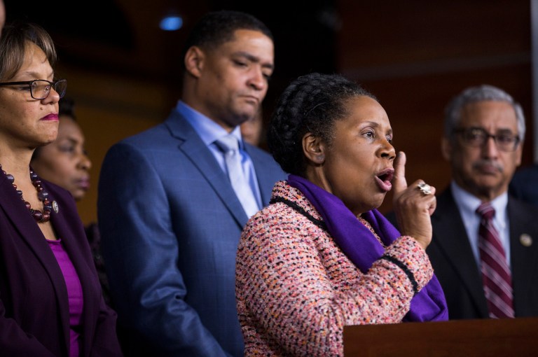 The group of roughly 10 House members marched onto the Senate floor to draw attention to their opposition to Sessions. (AP Photo/Zach Gibson)