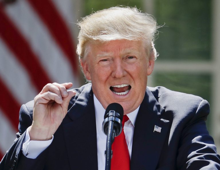 President Donald Trump gestures while speaking about the U.S. role in the Paris climate change accord, Thursday, June 1, 2017, in the Rose Garden of the White House in Washington. (AP Photo/Pablo Martinez Monsivais)