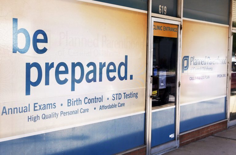 Planned Parenthood offers regular gynecological care and birth control. (AP Photo/Sue Ogrocki)