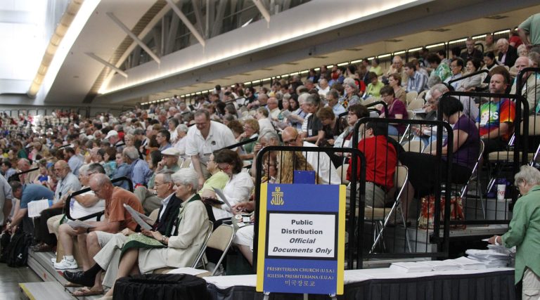 FILE - People listen to a session of the 220th General Assembly (2012) of the Presbyterian Church (USA) on in this July 5, 2012 file photo taken in Pittsburgh. The Presbyterian General Assembly, meeting in Detroit June 14-21, 2014, will consider withdrawing its investments from some companies whose products are used by the Israeli government in the Palestinian territories. Divestment advocates were narrowly outmaneuvered at the last Presbyterian convention in 2012, losing a crucial ballot by just two votes. (AP Photo/Keith Srakocic, File)