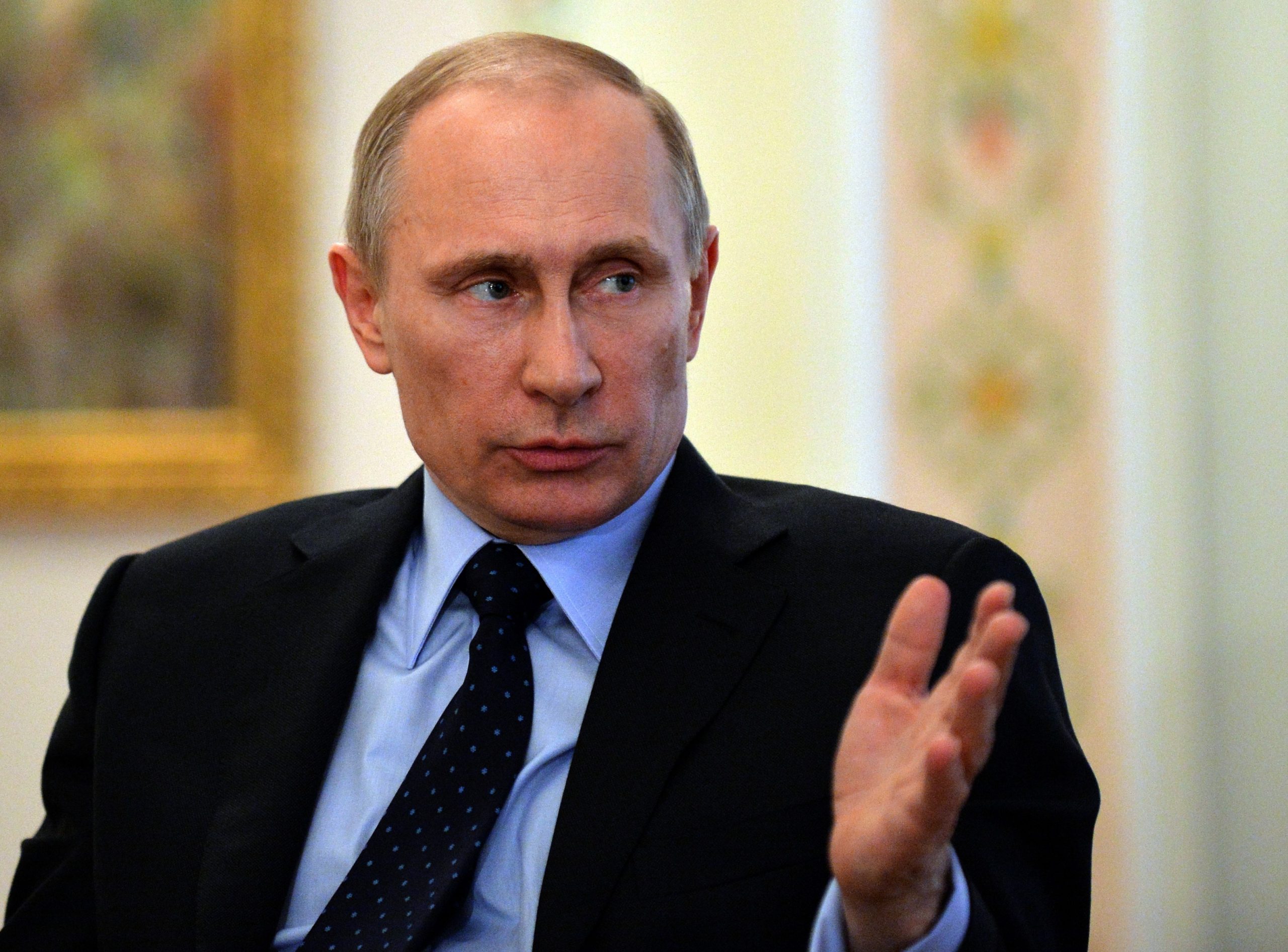 Putin uses carrot and stick to dominate neighbors