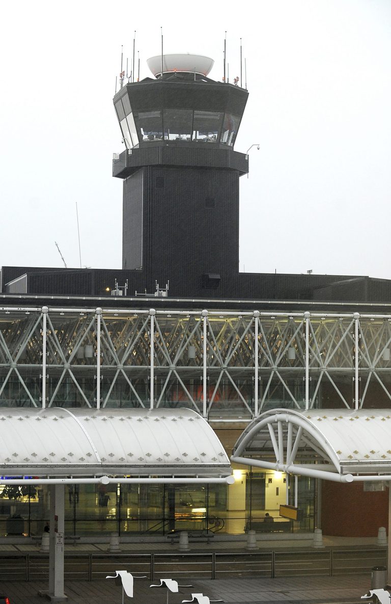 In this Thursday, Sept. 12, 2013 photo, the control tower at Baltimore-Washington International Thurgood Marshall Airport, in Linthicum, Md., is seen. A lightning strike on the tower, which also injured an air traffic controller, is prompting the Federal Aviation Administration to examine hundreds of air traffic control towers nationwide, the agency told The Associated Press. Officials will be looking for problems with the systems that protect the towers from lightning strikes. (AP Photo/The Capital, Paul W. Gillespie)