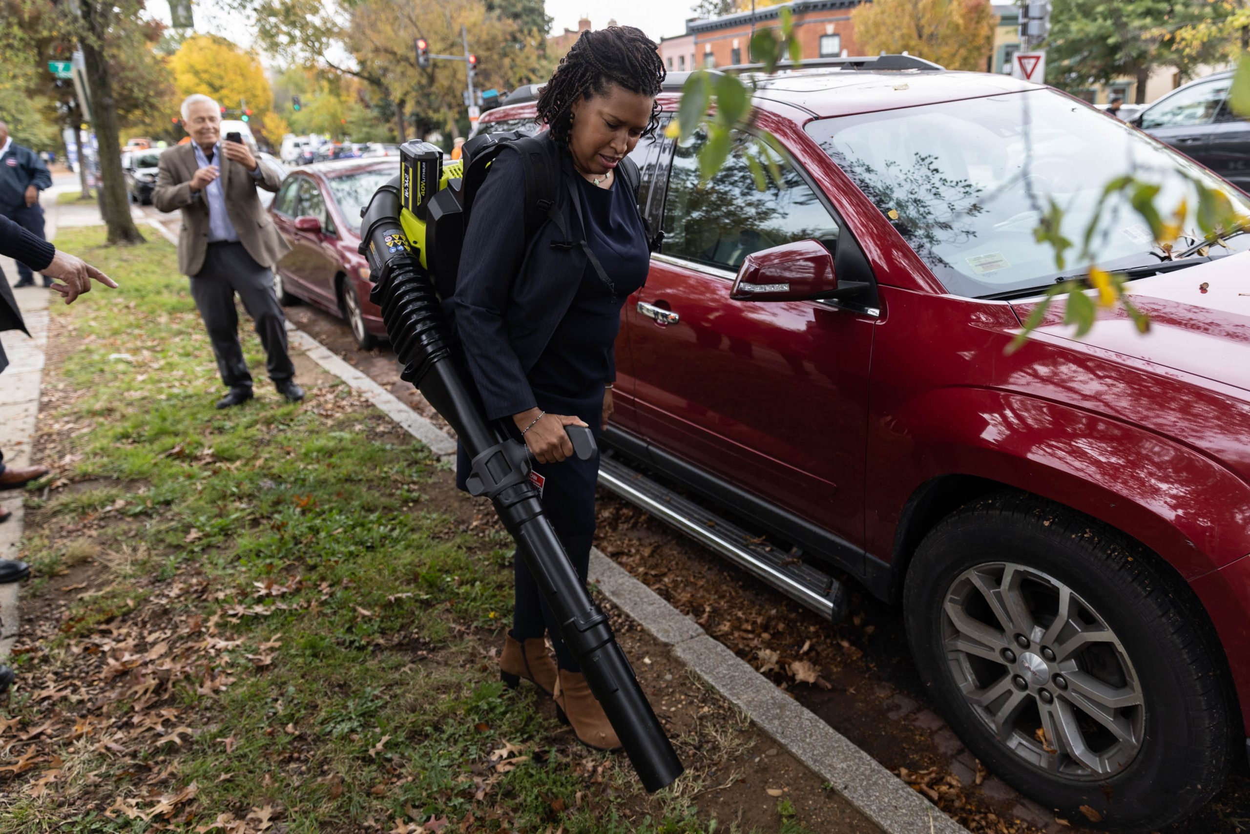 Washington Mayor Muriel Bowser uses a leaf blower at a District of Columbia Department of Public Works event to announce the district's snow and leaf collection season on Monday, Oct. 24, 2022.