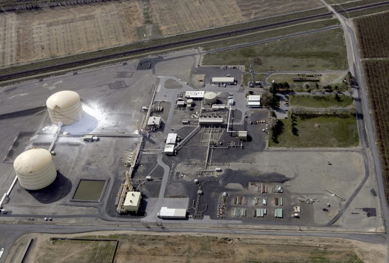 In this aerial photo, the Williams Northwest Pipeline plant is seen after a large explosion and fire in Plymouth, Wash., Monday, March 31, 2014. Benton County Sheriff Steven Keane said some gas leaked from the tank to the ground in a containment area and evaporated into the air, but it was only a small amount. (AP Photo/The Tri-City Herald, Sarah Gordon)
