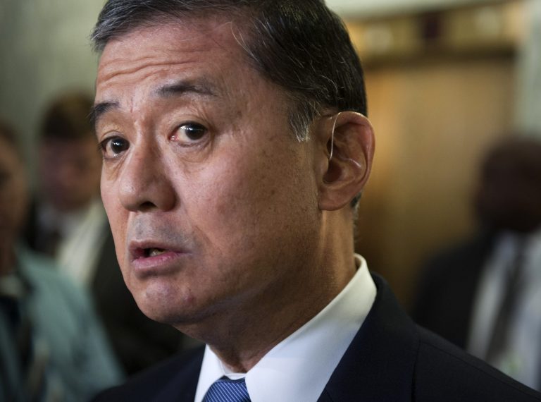 In this May 15, 2014, photo, Veterans Affairs Secretary Eric Shinseki speaks with the news media on Capitol Hill in Washington. Shinseki would be granted more authority to fire or demote senior executives under a bill headed to the House floor. The measure comes as pressure builds on Capitol Hill to overhaul the beleaguered agency in response to allegations of treatment delays and preventable deaths.  (AP Photo/Cliff Owen)