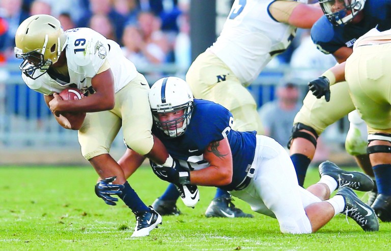 Rob Carr/Getty Images
Keenan Reynolds has led Navy to six wins in its last seven games.