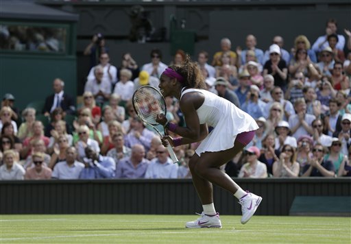 Serena Williams of the United States against Victoria Azarenka of Belarus during a semifinals match at Wimbledon. (AP photo)