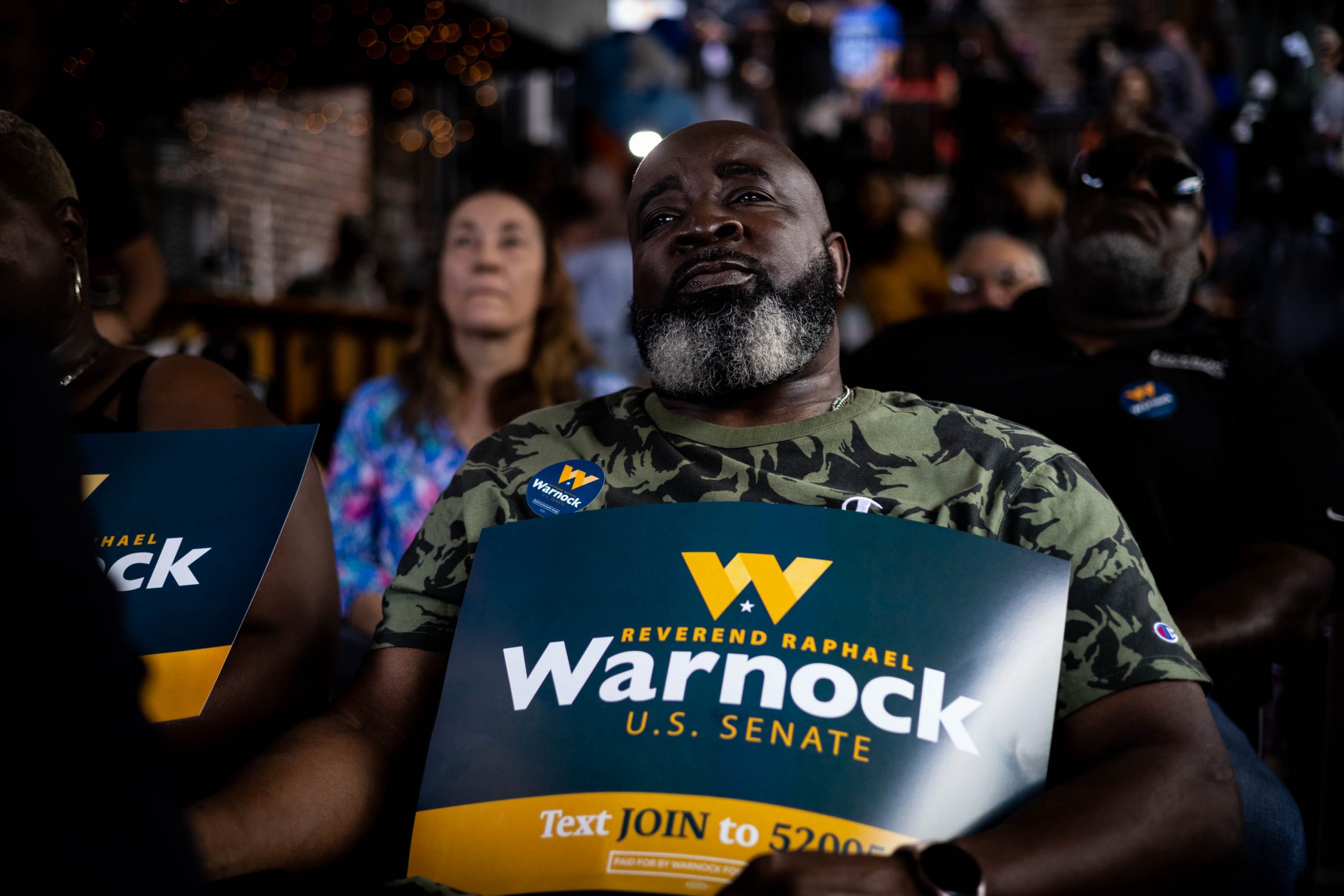 Supporters of Sen. Raphael Warnock at a campaign rally in Macon, Georgia, Monday, November, 7, 2022