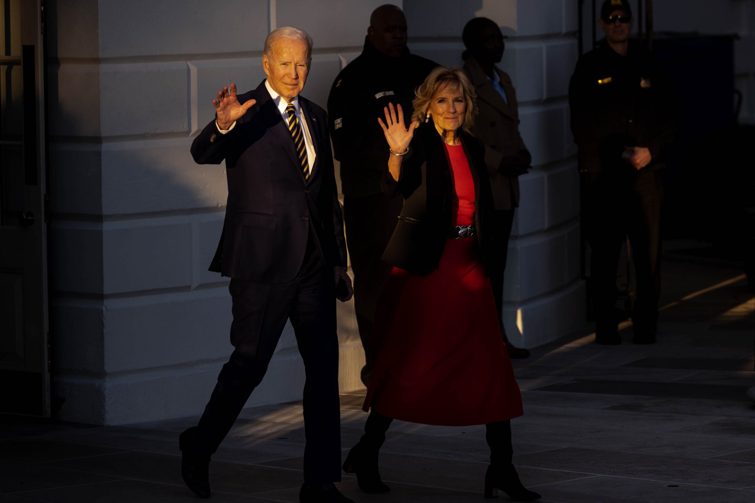 President Joe Biden and first lady Dr. Jill Biden make their way to board Marine One on the South Lawn of the White House on Monday, Nov. 21, 2022. 