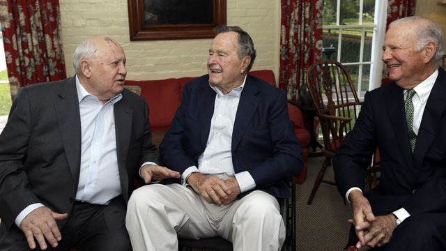 Former President George H.W. Bush, center, with former Soviet President Mikhail Gorbachev, left,  and former U.S. Secretary of State James Baker, right, visiting in Houston earlier this year. (AP Photo/David J. Phillip)