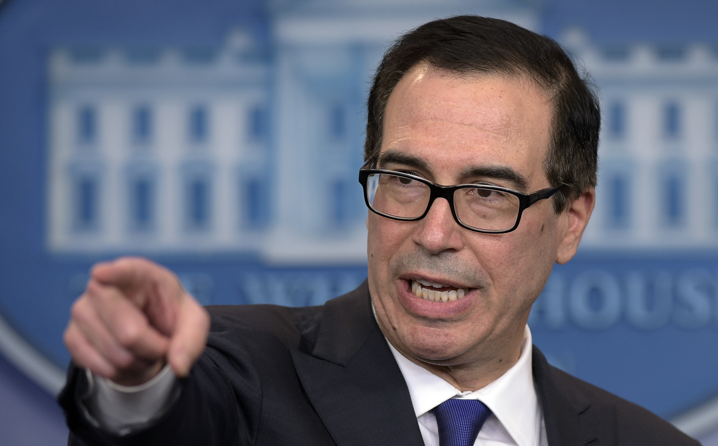 Trump to reimpose Iran sanctions, with waivers for some oil purchasers