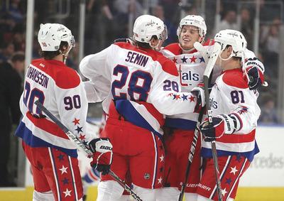 Nick Laham/Getty Images
The Capitals cruised past the Rangers on Saturday night to finish seventh in the Eastern Conference, setting up a matchup with the defending Stanley Cup champion Bruins.