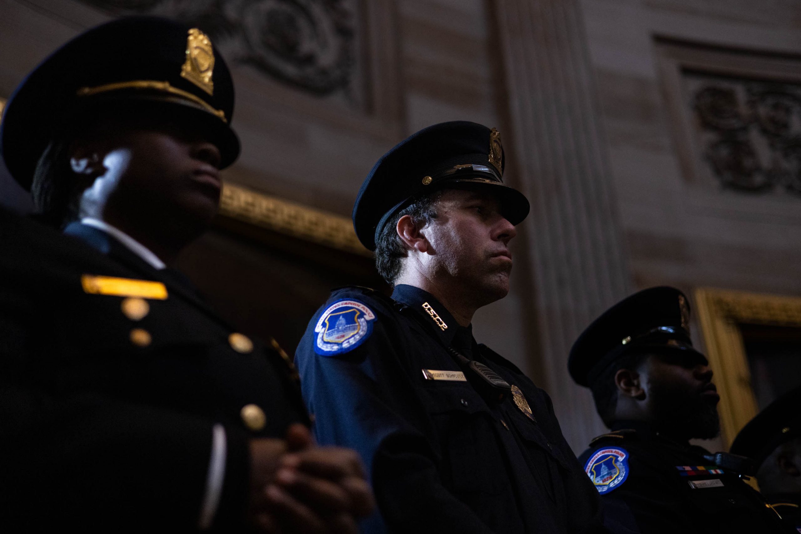 Capitol Hill police officers participate in a Congressional Gold Medal ceremony honoring law enforcement officers who defended the U.S. Capitol on Jan. 6, 2021, in the U.S. Capitol Rotunda, Tuesday, December 6, 2022.