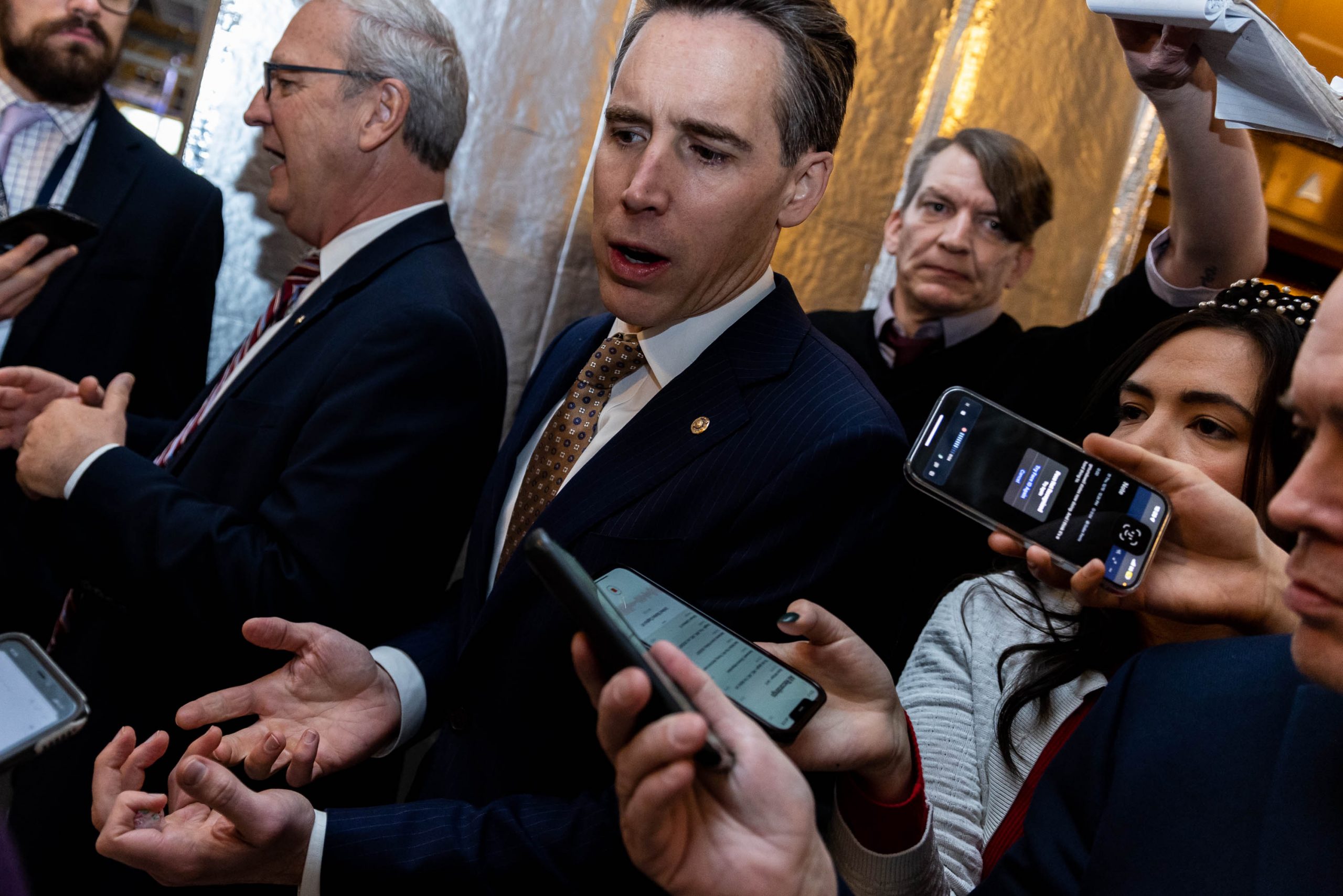 Sen. Josh Hawley takes questions from reporters on Capitol Hill, Thursday, December 15, 2022, Hawley introduced the  'No TikTok on Government Devices Act,' which the Senate unanimously approved legislation banning the use of TikTok on government phones and devices as part of the push to combat security concerns related to the Chinese-owned social media company. 