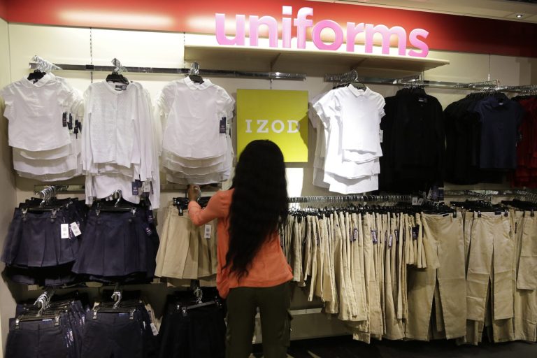   FILE - In this July 31, 2013, file photo, school uniforms by Izod are displayed at J.C. Penney in New York. The Commerce Department said Tuesday, Aug. 13, 2013, that retail sales increased 0.2 percent in July from June. Sales had risen 0.6 percent in June from May on a surge in auto sales. (AP Photo/Mark Lennihan, File)  