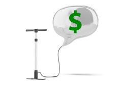 Why do prices on public works projects often inch higher and higher?