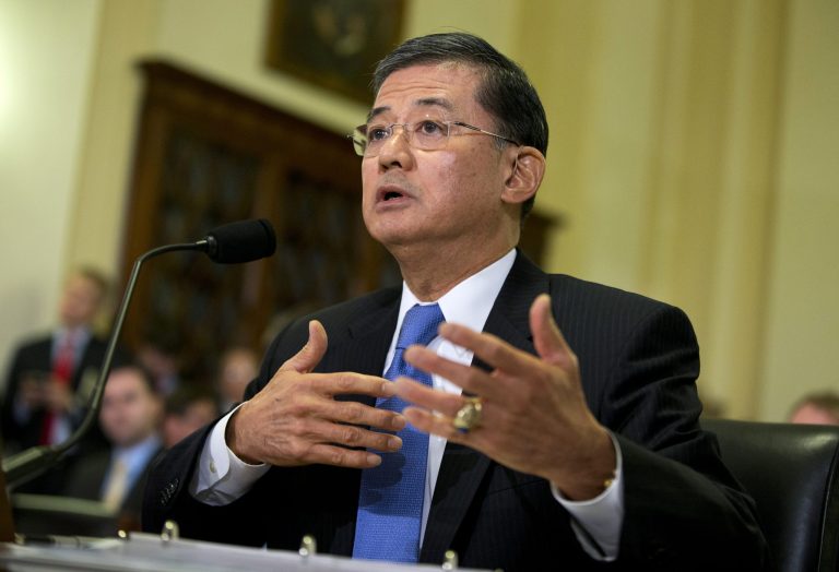 Veterans Affairs Secretary Eric Shinseki testifies on Capitol Hill in Washington, Wednesday, Oct. 9, 2013, before the House Veterans Affairs Committee hearing on the effects the government shutdown is having on benefits and services to veterans. About 3.8 million veterans will not receive disability compensation next month if the partial government shutdown continues into late October, Shinseki told lawmakers Wednesday. Some 315,000 veterans and 202,000 surviving spouses and dependents will see pension payments stopped.  (AP Photo/ Evan Vucci)