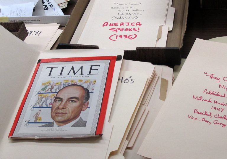   This Dec. 11, 2012 photo shows a 1948 cover of Time Magazine featuring the late George Gallup Sr., the founder of the Gallup Poll, at the University of Iowa library in Iowa City, Iowa. Gallup's grandchildren recently donated more than 200 boxes of papers that document the career of Gallup, who is considered the father of modern political polling. (AP Photo/Ryan J. Foley)  