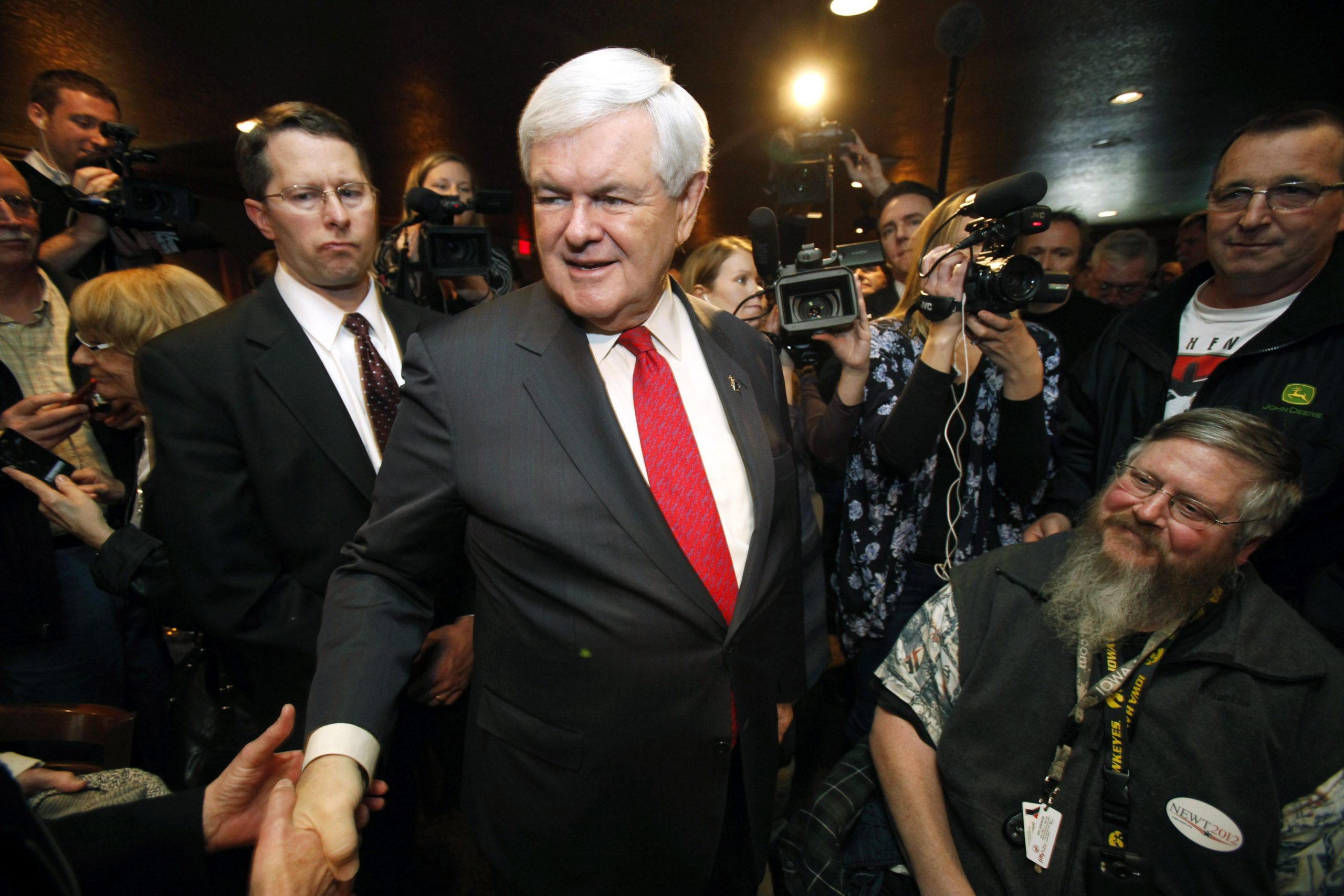 Newt sees Iowa as three-way race