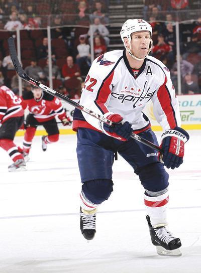 NEWARK, NJ-NOVEMBER 11: Mike Knuble#22 of the Washington Capitals against the New Jersey Devils at Prudential Center on November 11, 2011 in Newark, New Jersey.(Photo by Nick Laham/Getty Images)