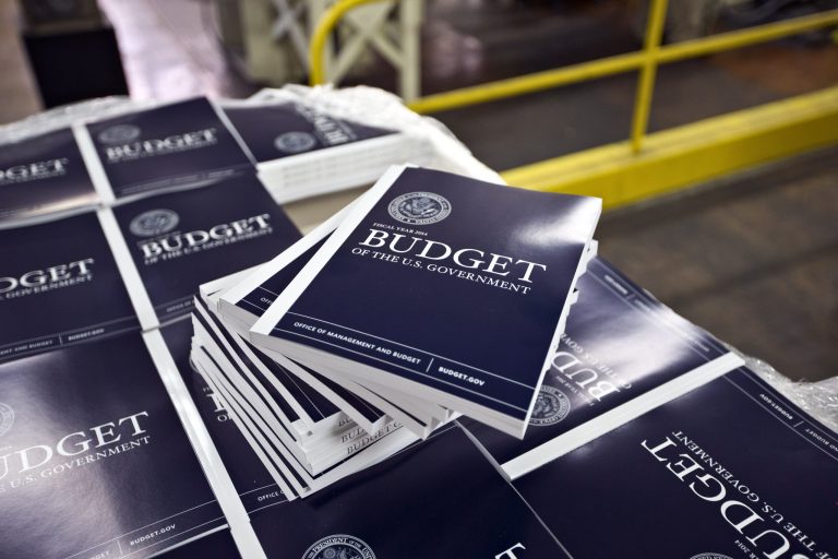 Copies of President Obama's budget plan for fiscal year 2014 are prepared for delivery at the U.S. Government Printing Office in Washington on April 8. (AP Photo/J. Scott Applewhite)