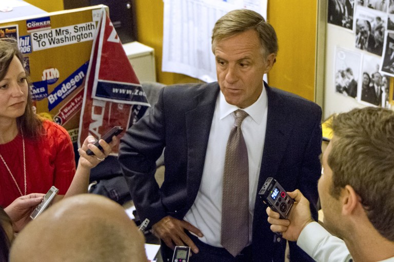 CORRECTS MONTH IN DATE - Gov. Bill Haslam speaks to reporters during an impromptu visit in the press suite at the legislative office complex in Nashville, Tenn., on Tuesday, April 16, 2013. The Republican governor said he still doesn't know why federal agents searched the Knoxville headquarters of the family-owned Pilot Flying J chain of truck stops. (AP Photo/Erik Schelzig).