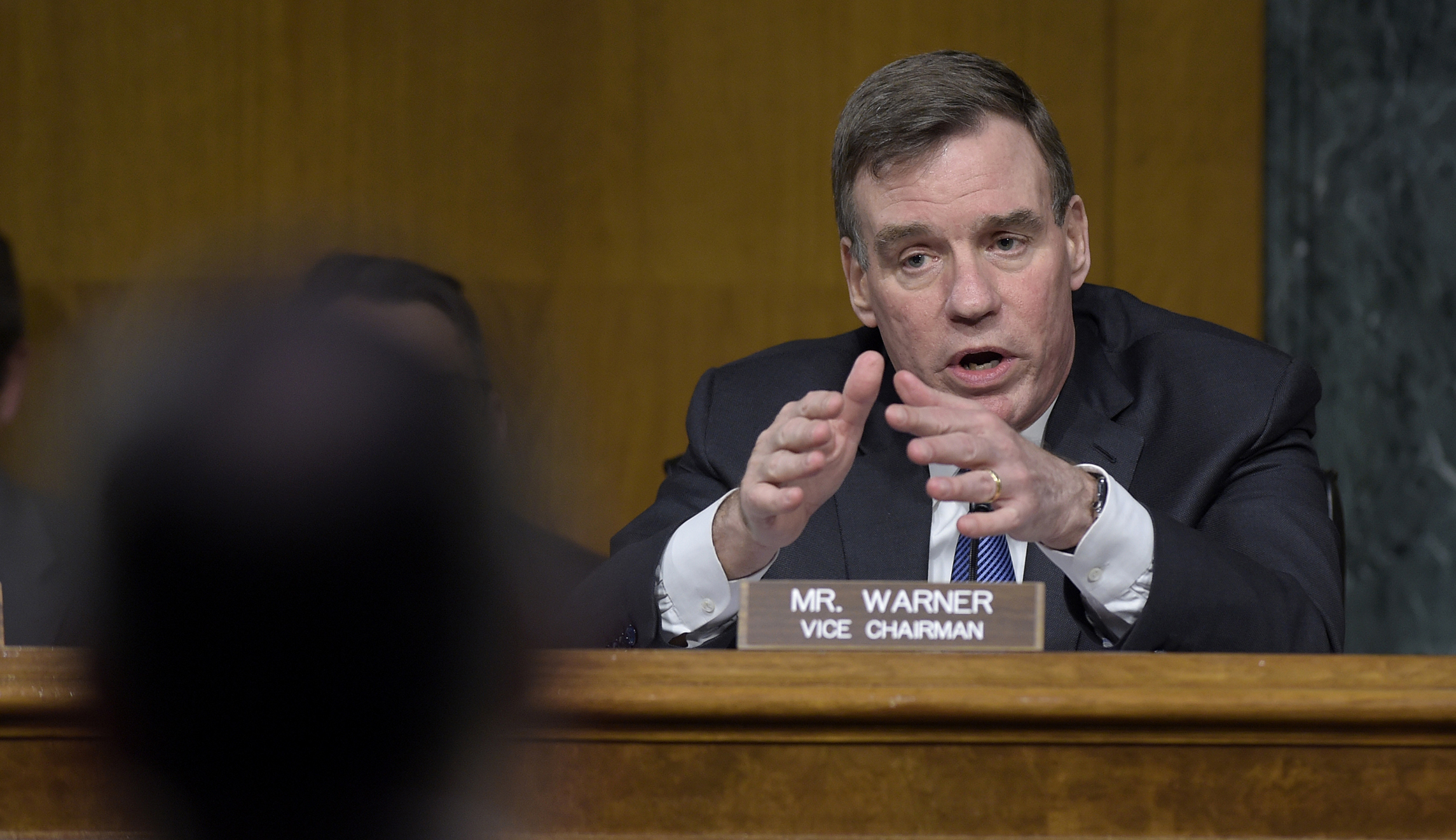 Mark Warner: It’s ‘more than bizarre’ Trump hasn’t condemned Putin
