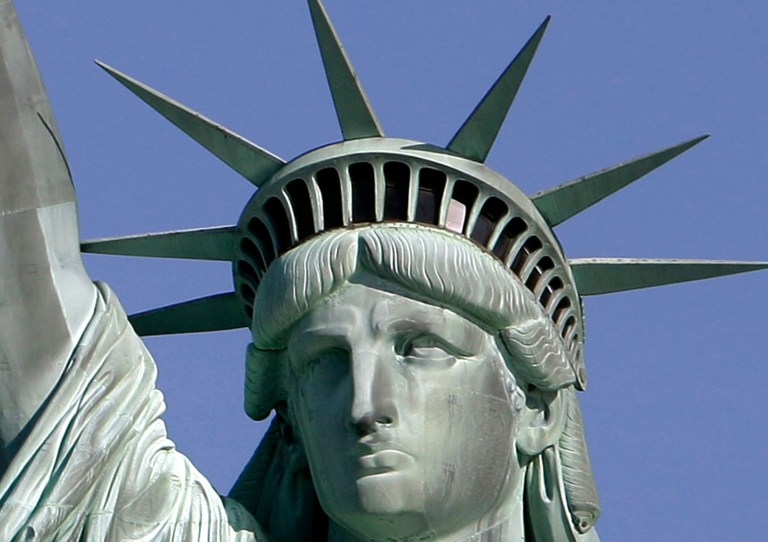 FILE - This May 20, 2009 file photo shows the Statue of Liberty in New York Harbor. The Statue of Liberty is reopening July 4, 2013, after Liberty Island flooded during Superstorm Sandy, and tickets for the ferry ride to the island are now on sale. The statue has been closed since Sandy struck the region on Oct. 29 and damaged much of the island's infrastructure. The statue itself is on higher ground and was not damaged.(AP Photo/Richard Drew, File)