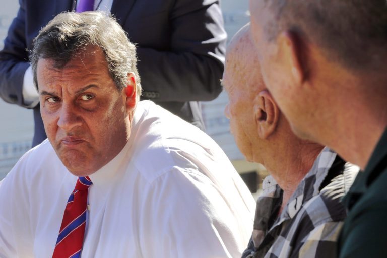 Republican presidential candidate New Jersey Gov. Chris Christie talks with employees during a campaign stop at East Coast Lumber Wednesday, Oct. 7, 2015, in East Hampstead, N.H. (AP Photo/Jim Cole)
