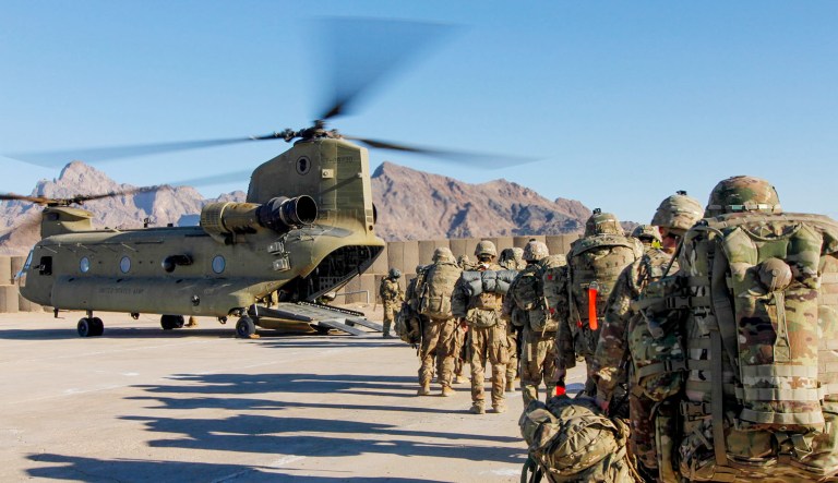 U.S. troops board a helicopter in Afghanistan.