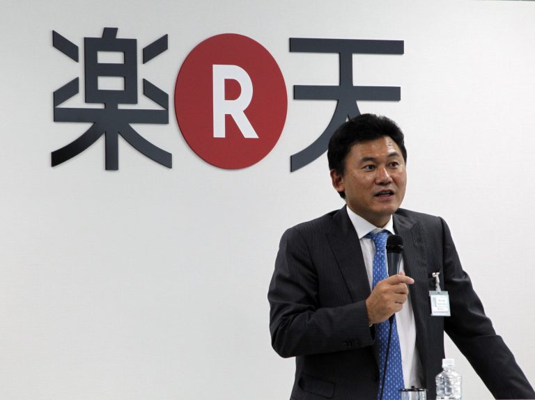 FILE  - In this Oct. 3, 2011 photo, Rakuten Inc.,Chief Executive Hiroshi Mikitani gives a pep talk in English, the standard language at Rakuten, at a welcoming ceremony for new hires at its headquarters in Tokyo. Rakuten is buying Cyprus-based Viber Media, which operates a popular Internet phone application, for $900 million, fortifying the online retailer's social networking footprint. (AP Photo/Koji Sasahara, File)
