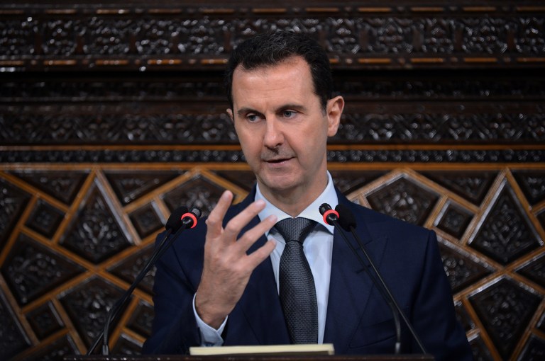 Officials don't think they have authorization to order U.S. troops to engage Syrian President Bashar Assad's forces. (SANA via AP)
