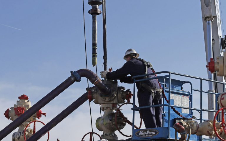 Rules would require reductions of methane from new wells and began assembling rules for existing wells. (AP Photo/Brennan Linsley)