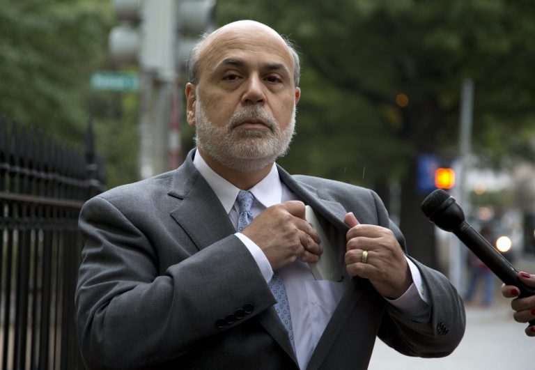 Former Federal Reserve Chairman Ben Bernanke arrives at federal court in Washington, Friday, Oct. 10, 2014. On Thursday, Bernanke testified in federal court that insurance giant American International Group Inc. had to be rescued by the government in 2008 to avert global catastrophe.  (AP Photo/Carolyn Kaster)