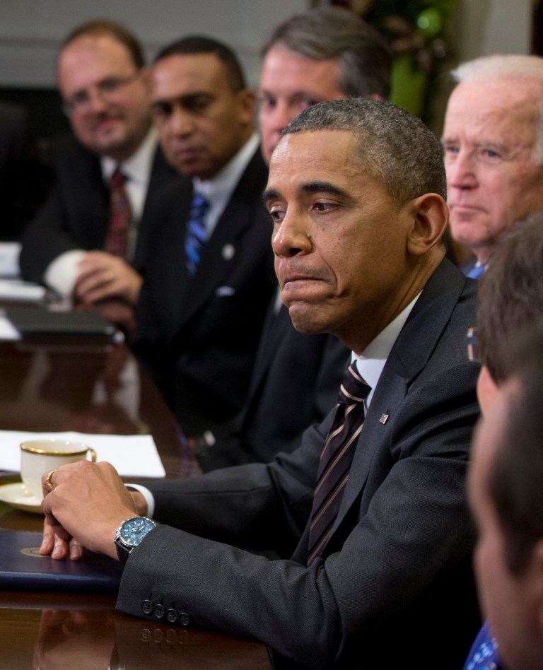 President Obama, accompanied by Vice President Joe Biden, speaks to the media before meeting with newly elected mayors from across the country, on Friday in the Roosevelt Room of the White House in Washington. (AP Photo/Carolyn Kaster)