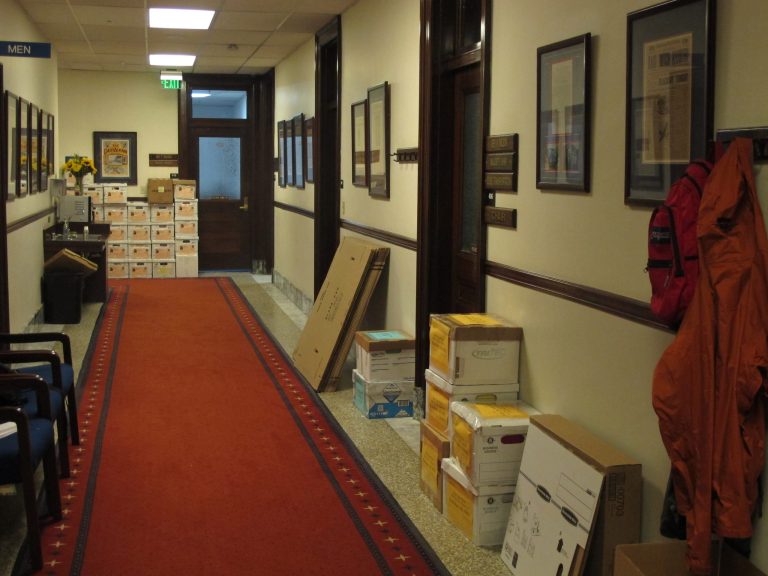 Packing boxes dot the walls on the fourth floor of the state Capitol late Saturday, April 19, 2014, in Juneau, Alaska. Sunday marks the last scheduled day of the 90-day legislative session. (AP Photo/Becky Bohrer)