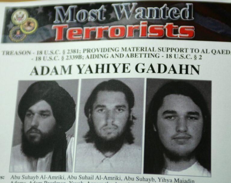 A wanted poster of Adam Yahiye Gadahn is displayed at the Justice Department in Washington. Pakistani officials say Adam Gadahn, the American-born spokesman for al-Qaida, has been arrested Sunday March 7, 2010. (AP Photo/Lawrence Jackson, File)
