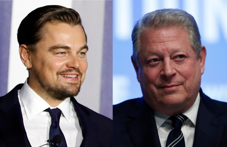 Gore helped to carry a banner during the march and posed in a number of pictures with march participants. DiCaprio could be seen waving around a 