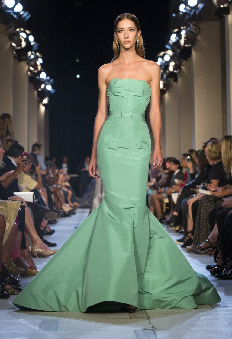   FILE - This Sept. 9, 2012 file photo shows a dress from the Zac Posen Spring 2013 collection during Fashion Week in New York. The rich, vibrant shade of emerald green is Pantone LLC's Color of the Year for 2013, beating out all the other shades of the rainbow. (AP Photo/John Minchillo, file)  